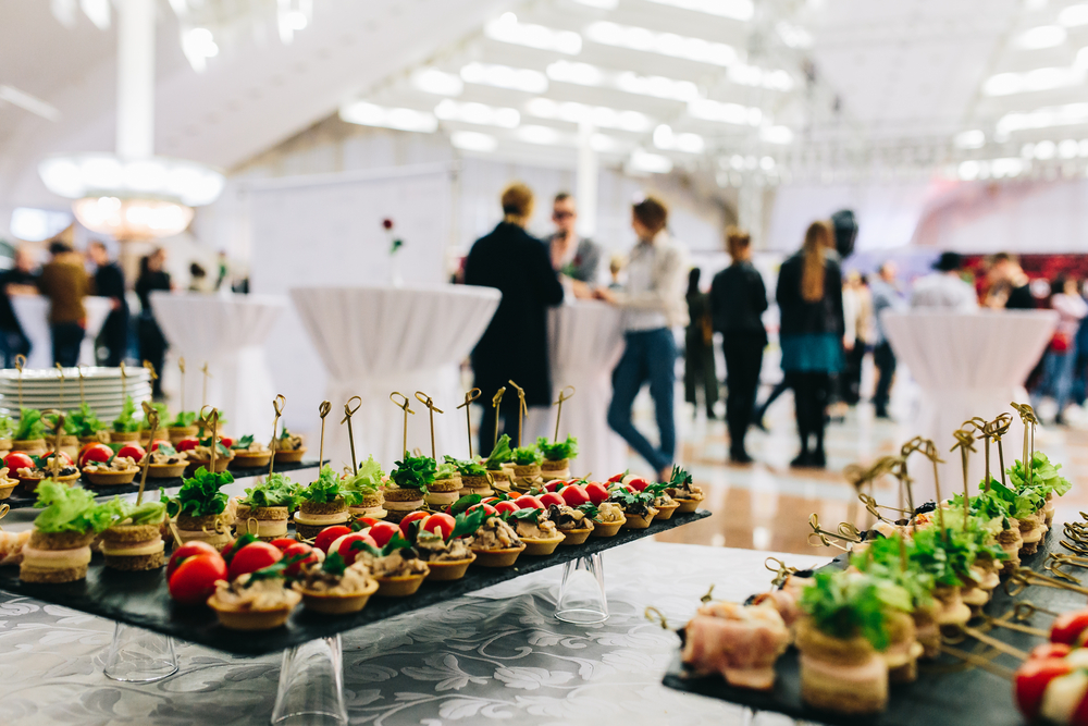 Same day events and hospitality courier services by Transol Sameday - elegantly arranged canapés and finger foods at an upscale corporate event venue